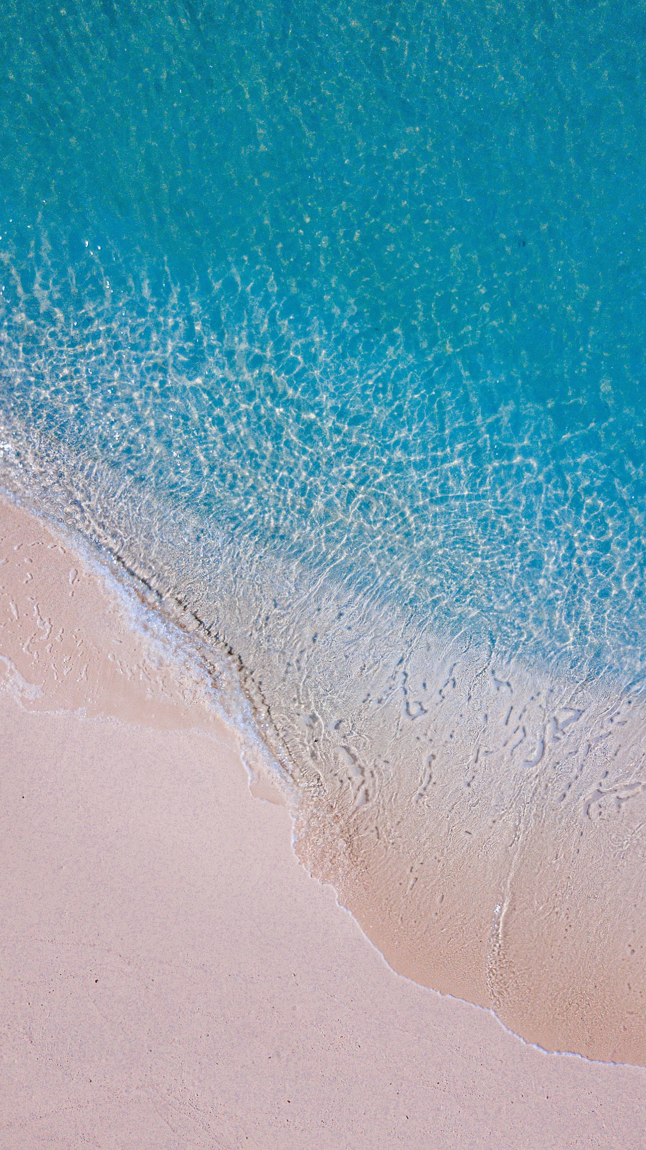 Beach Android, turquoise ocean, soft pink sand, 4K Phone Wallpaper