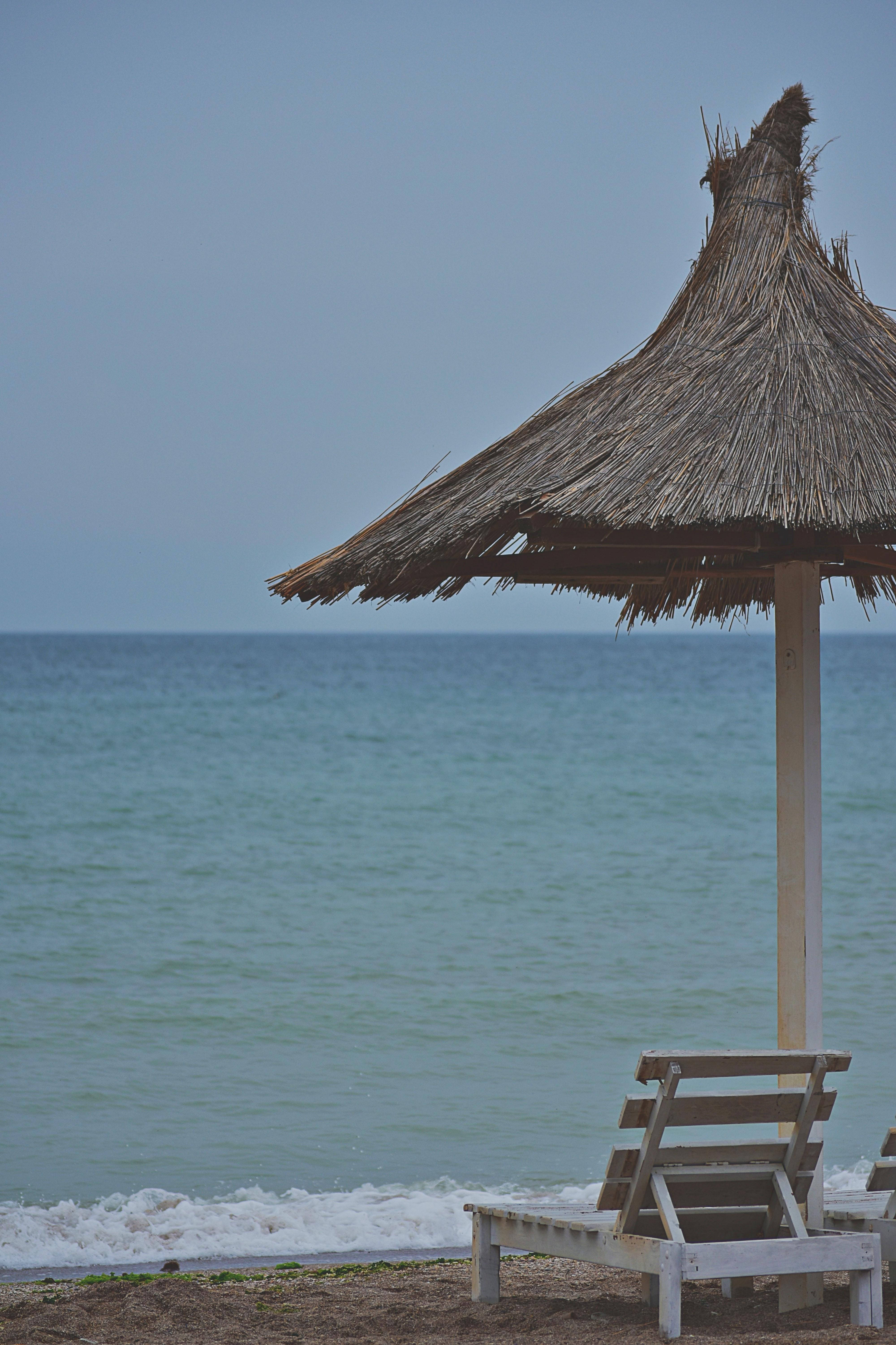 beach umbrella, wooden lounge chair, thatched, 5K Phone Wallpaper