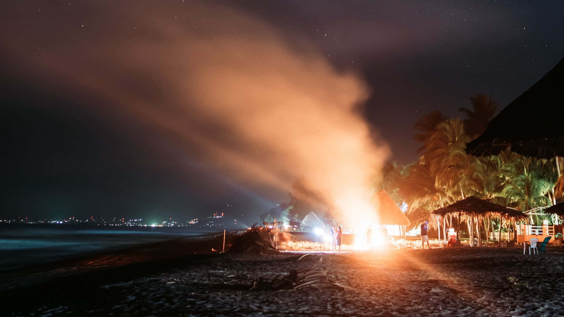 Beach Bonfire, palm trees, thatched huts, Full HD Desktop Wallpaper
