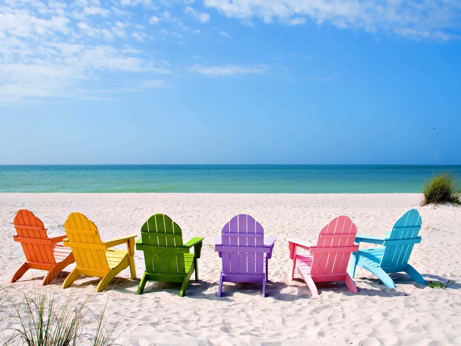 rainbow-colored Adirondack chairs, turquoise ocean, bright sunny beach, HD Desktop Wallpaper