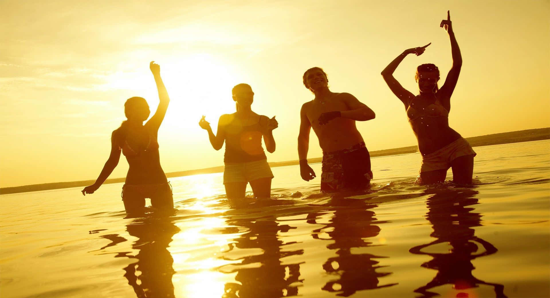 Beach Dance Party, golden sunset, shallow water, Full HD Desktop Wallpaper