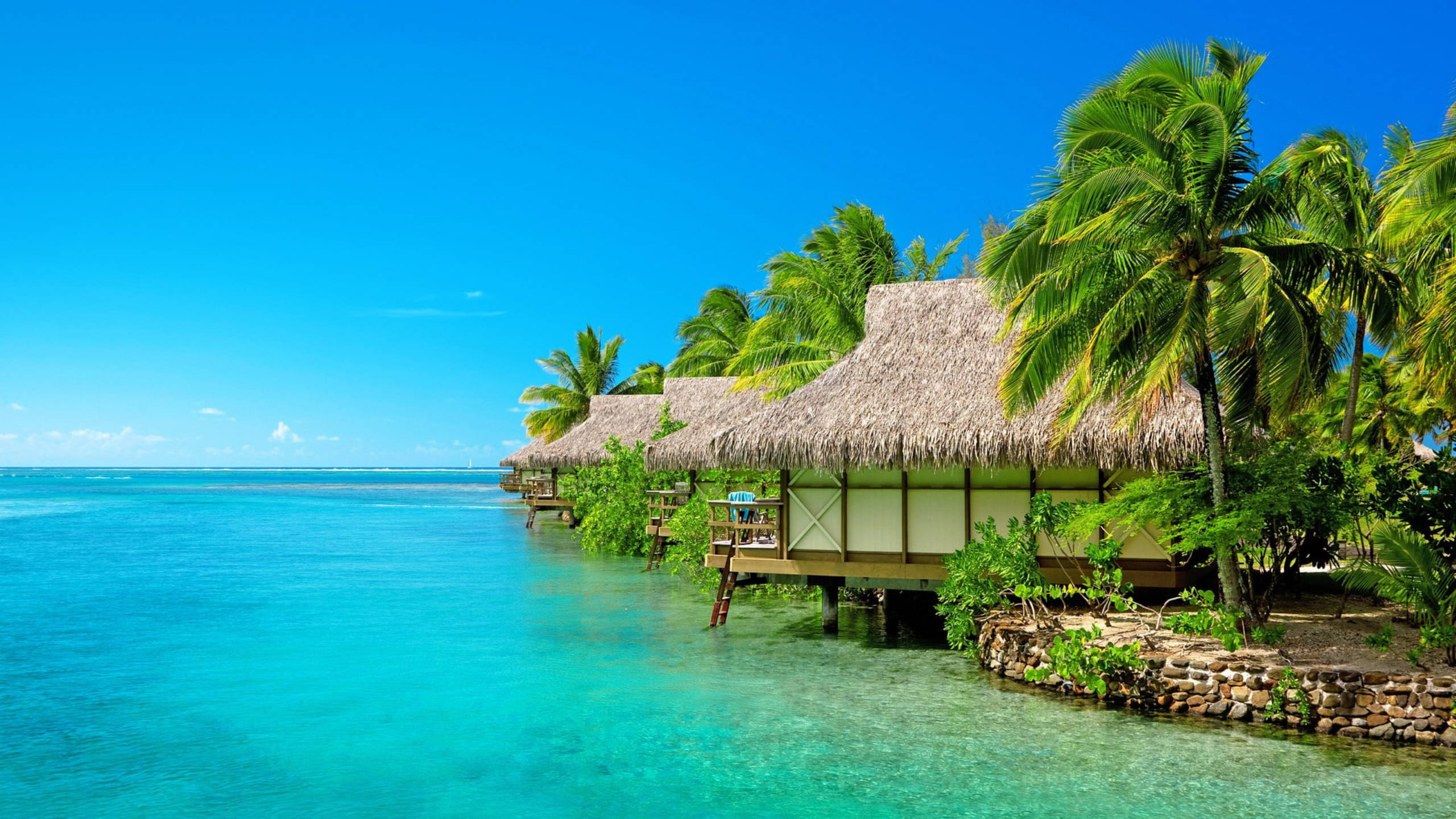 beach hut, over water, thatched roofs, 2K Desktop Wallpaper