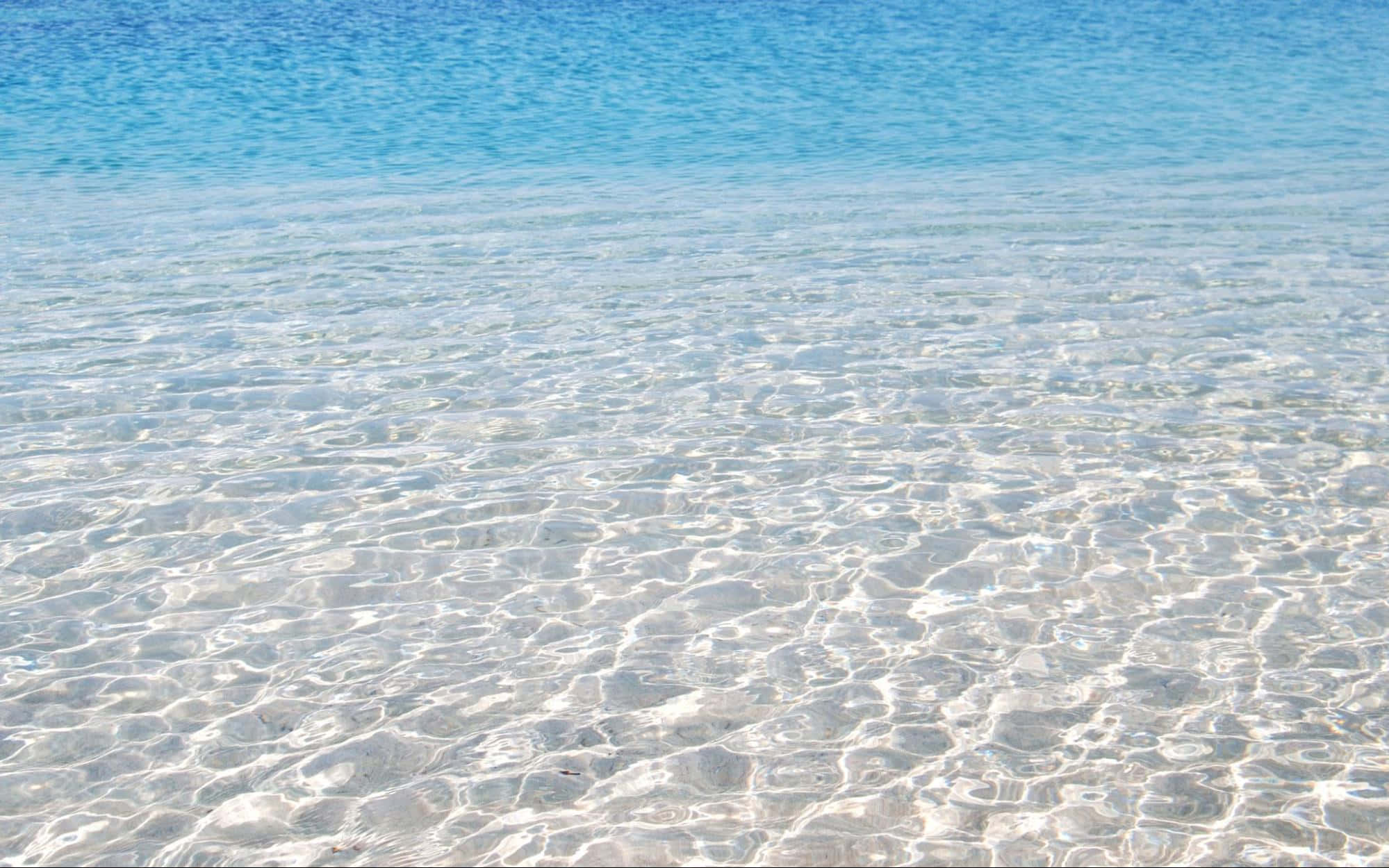 shallow end of a beach, crystal clear shallow water, white sandy bottom, Full HD Desktop Wallpaper