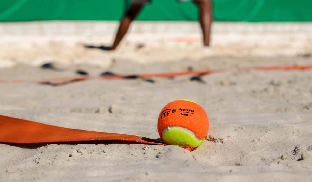 beach tennis, bright orange and yellow tennis ball, orange boundary line, SD Desktop Wallpaper