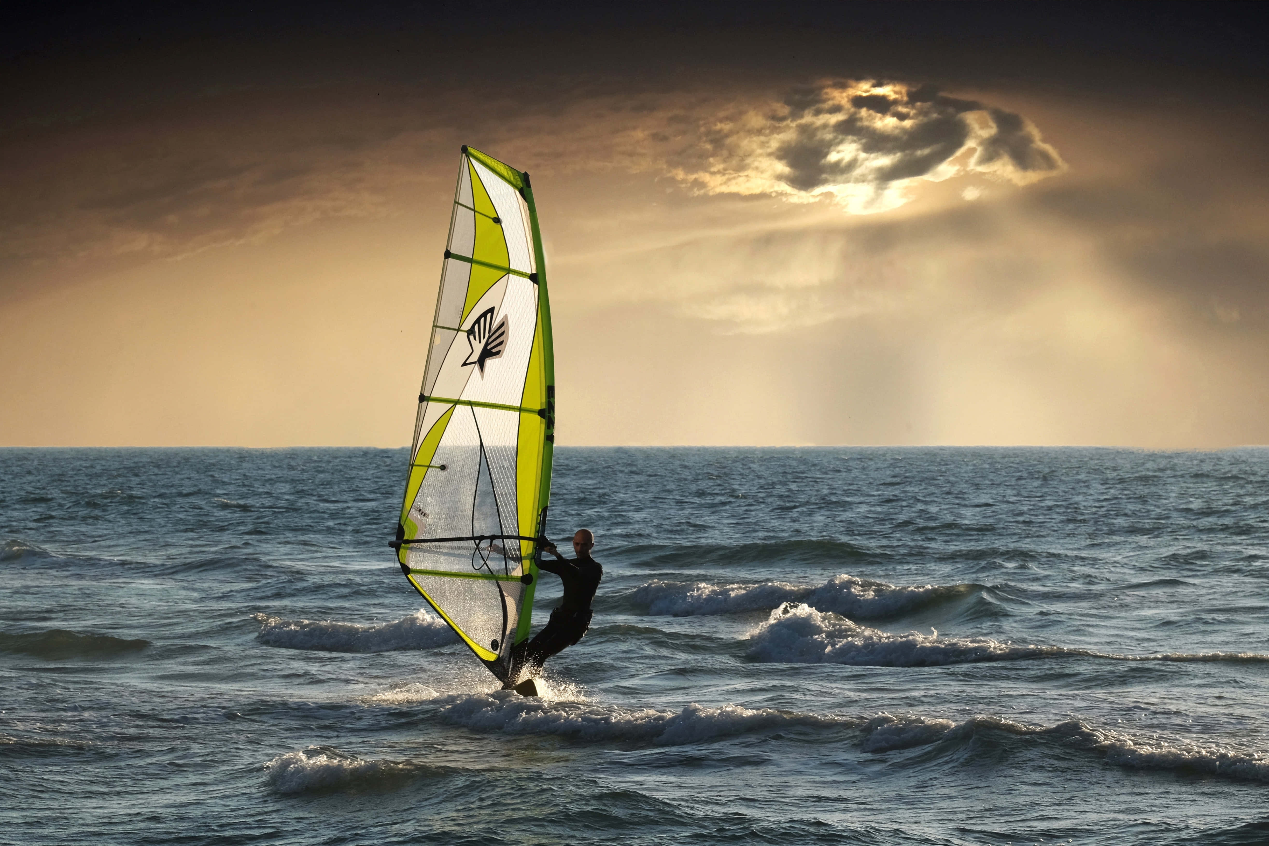 windsurfer, choppy ocean waves, dramatic sunset sky, 4K Desktop Wallpaper