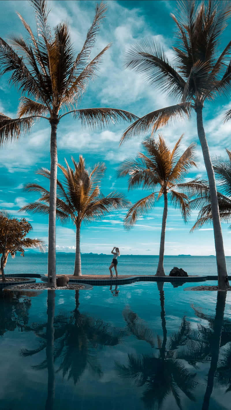 infinity pool, palm trees, turquoise ocean, HD Phone Wallpaper