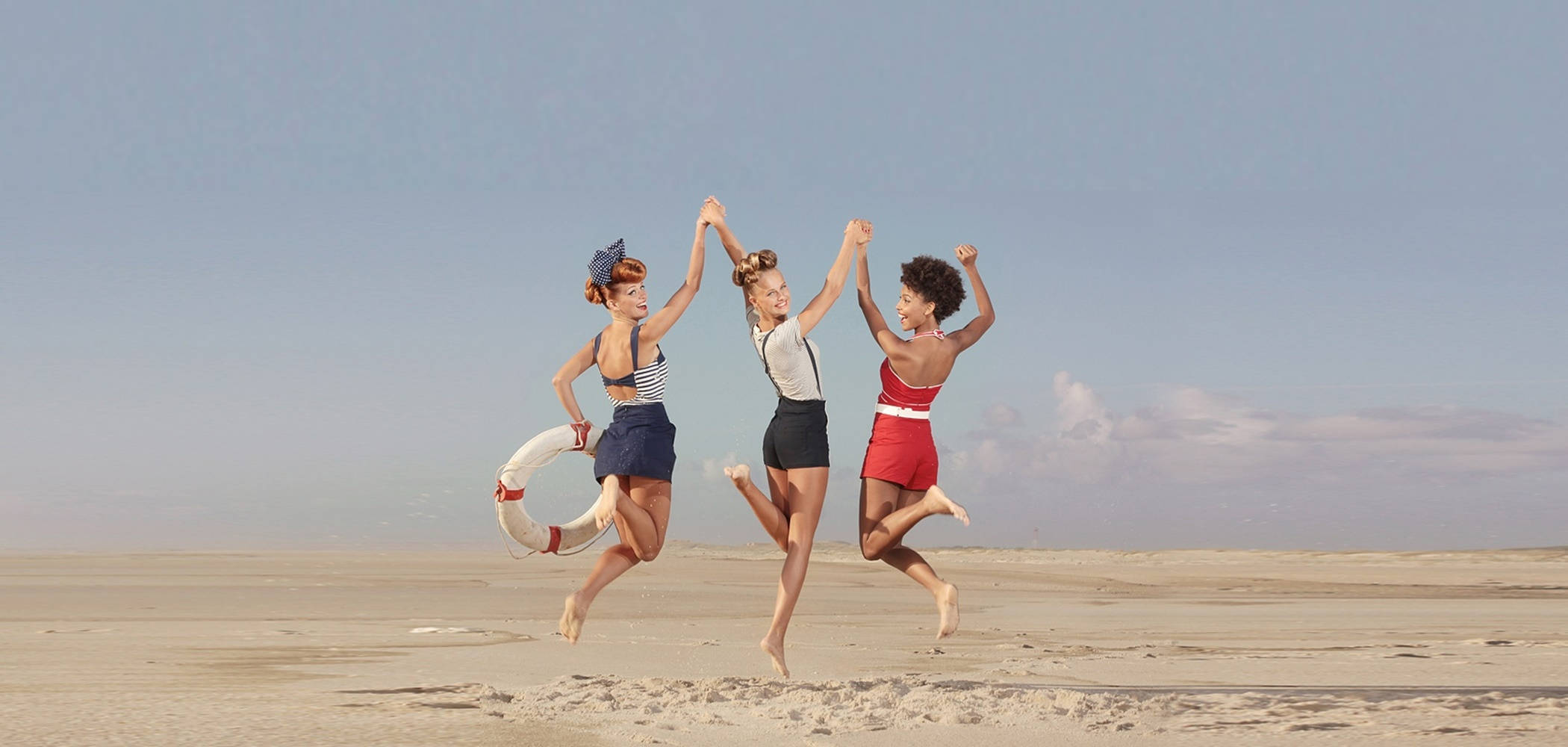 90s women beach friends, vast sandy beach, clear blue sky, Full HD Desktop Wallpaper