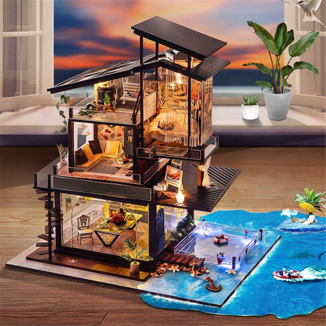 Dollhouse Modern Beach House, glowing interior lights, vibrant blue ocean, SD Desktop Wallpaper