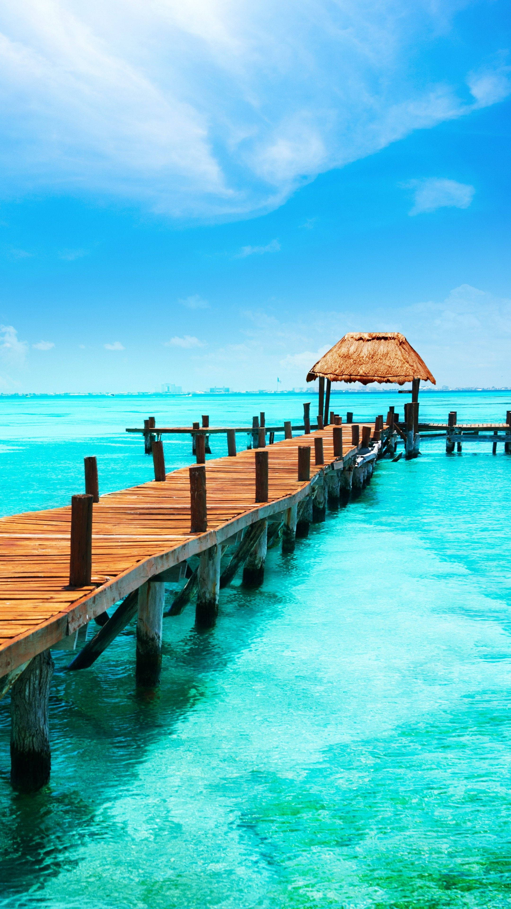 iPhone, wooden beach pier, crystal clear turquoise water, 4K Phone Wallpaper