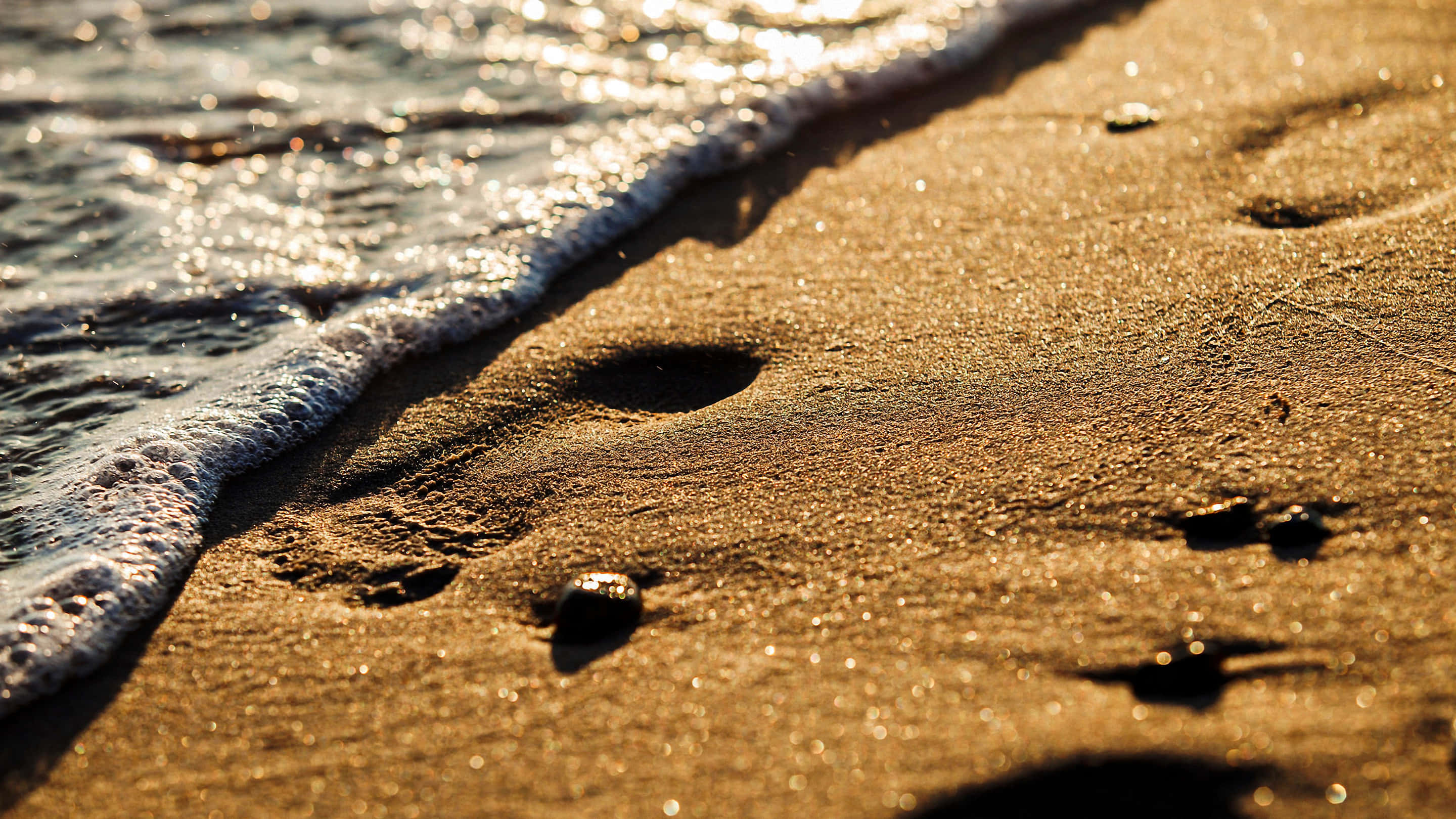 Sunlit Beach Sand, golden sand, ocean waves, 2K Desktop Wallpaper