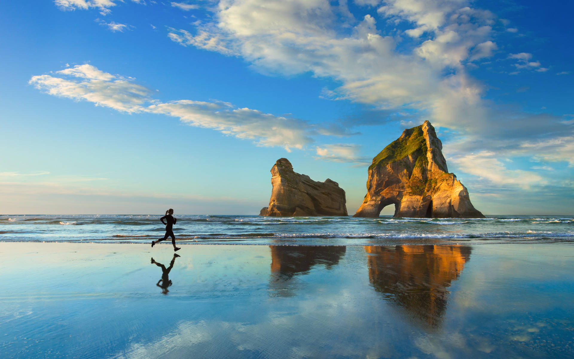 jogging by beach, wet beach, towering sea stacks, Full HD Desktop Wallpaper