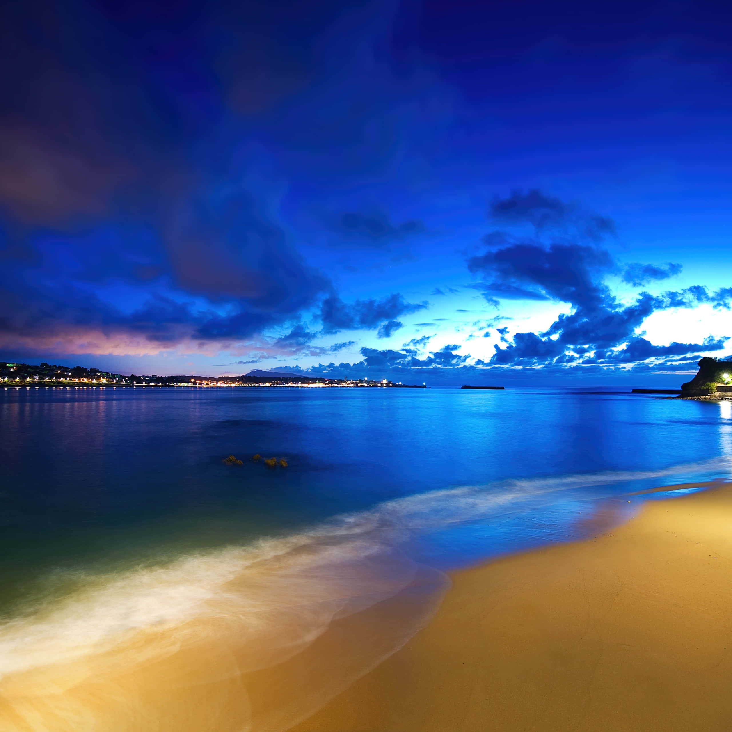 twilight beach, golden sand, calm blue waters, 2K Desktop Wallpaper