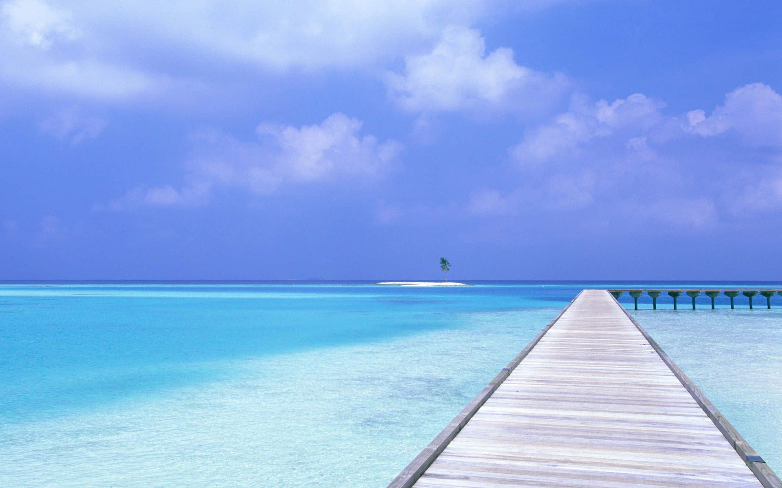 beach sky, long wooden pier, crystal clear turquoise water, 2K Desktop Wallpaper