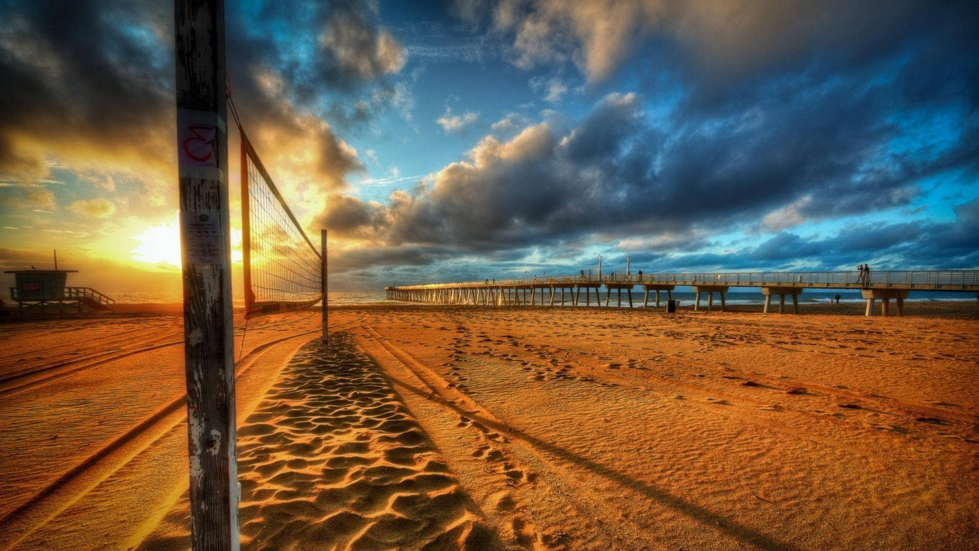 beach volleyball court, pier, golden sand, Full HD Desktop Wallpaper