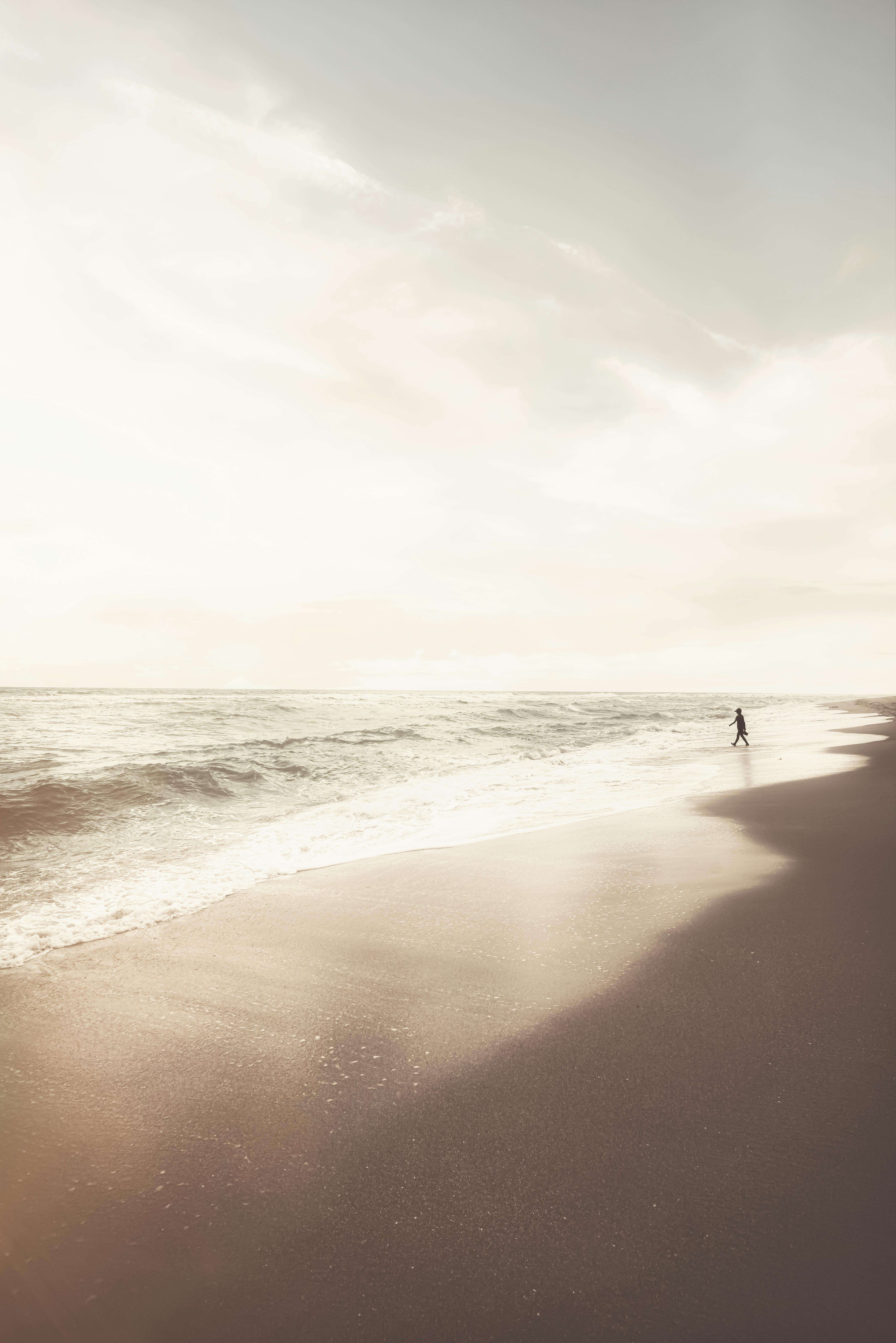 Serene Beach Walk, sunlit beach, gentle waves, 8K Phone Wallpaper