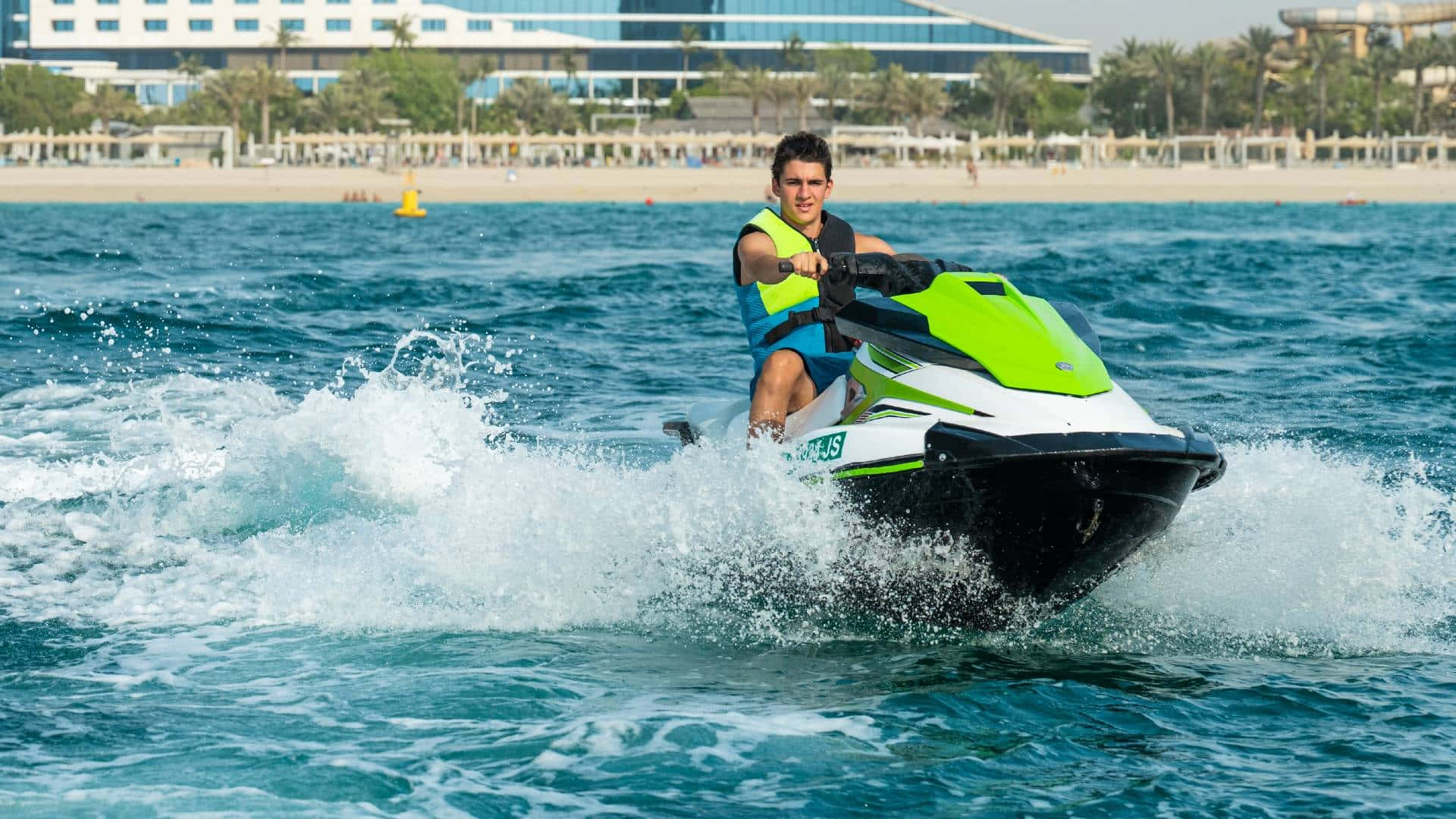 bright green jet ski, turquoise ocean water, sandy beach, Full HD Desktop Wallpaper