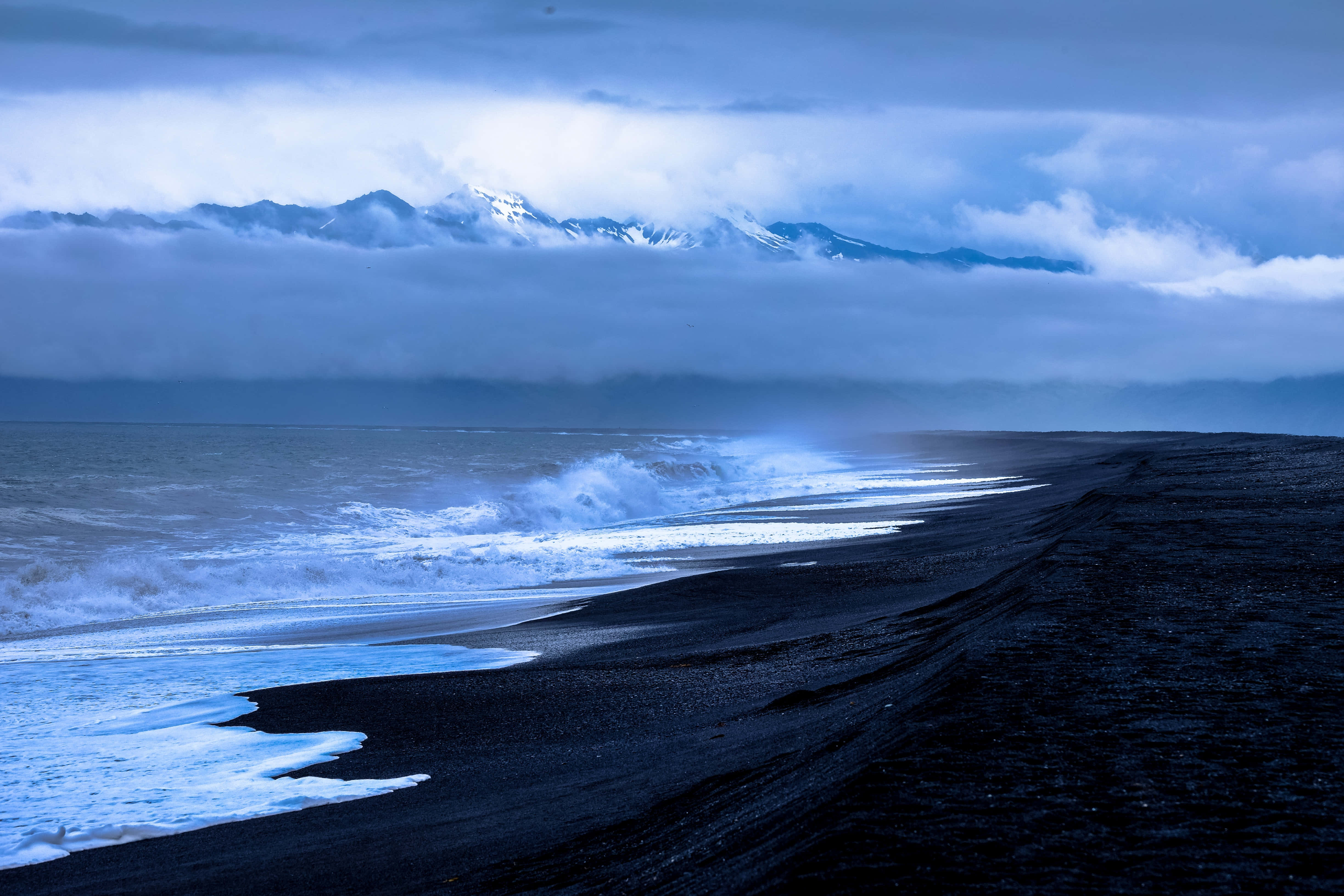 Beach Waves, black volcanic beach, moody blue sky, 4K Desktop Wallpaper
