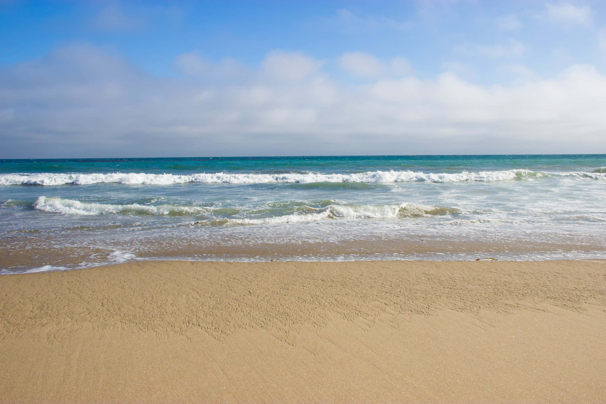 golden sandy beach, bright blue sky, scattered white clouds, Full HD Desktop Wallpaper