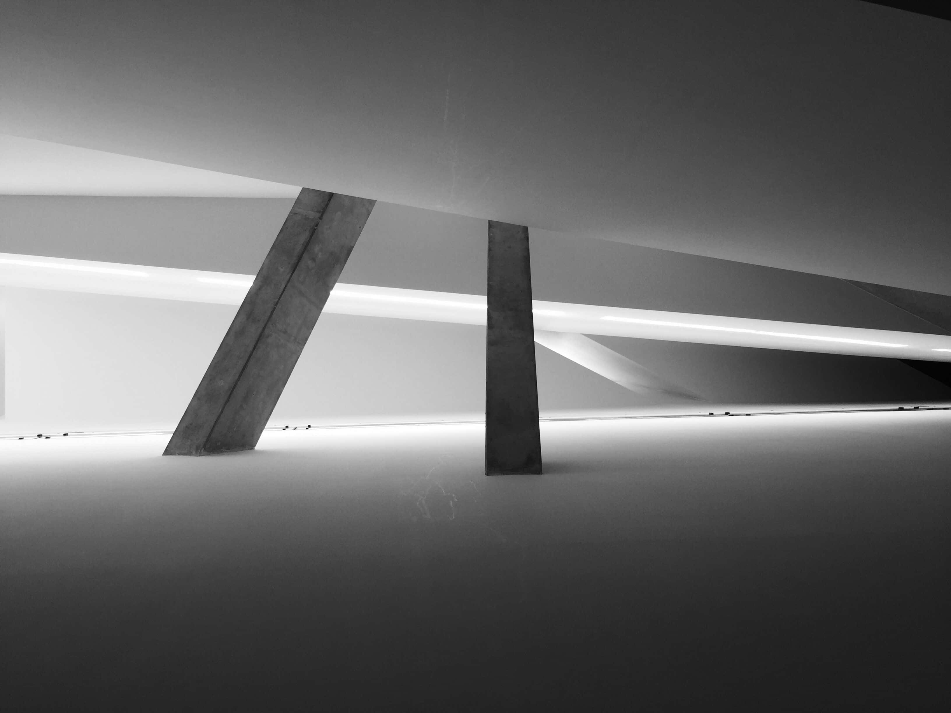 black and white architecture, monochrome architectural interior, stark concrete pillars, 2K Desktop Wallpaper