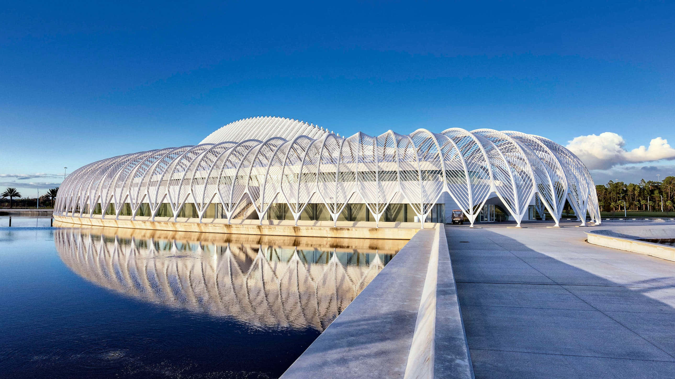 futuristic white architectural dome, curved steel ribs, calm water, 2K Desktop Wallpaper