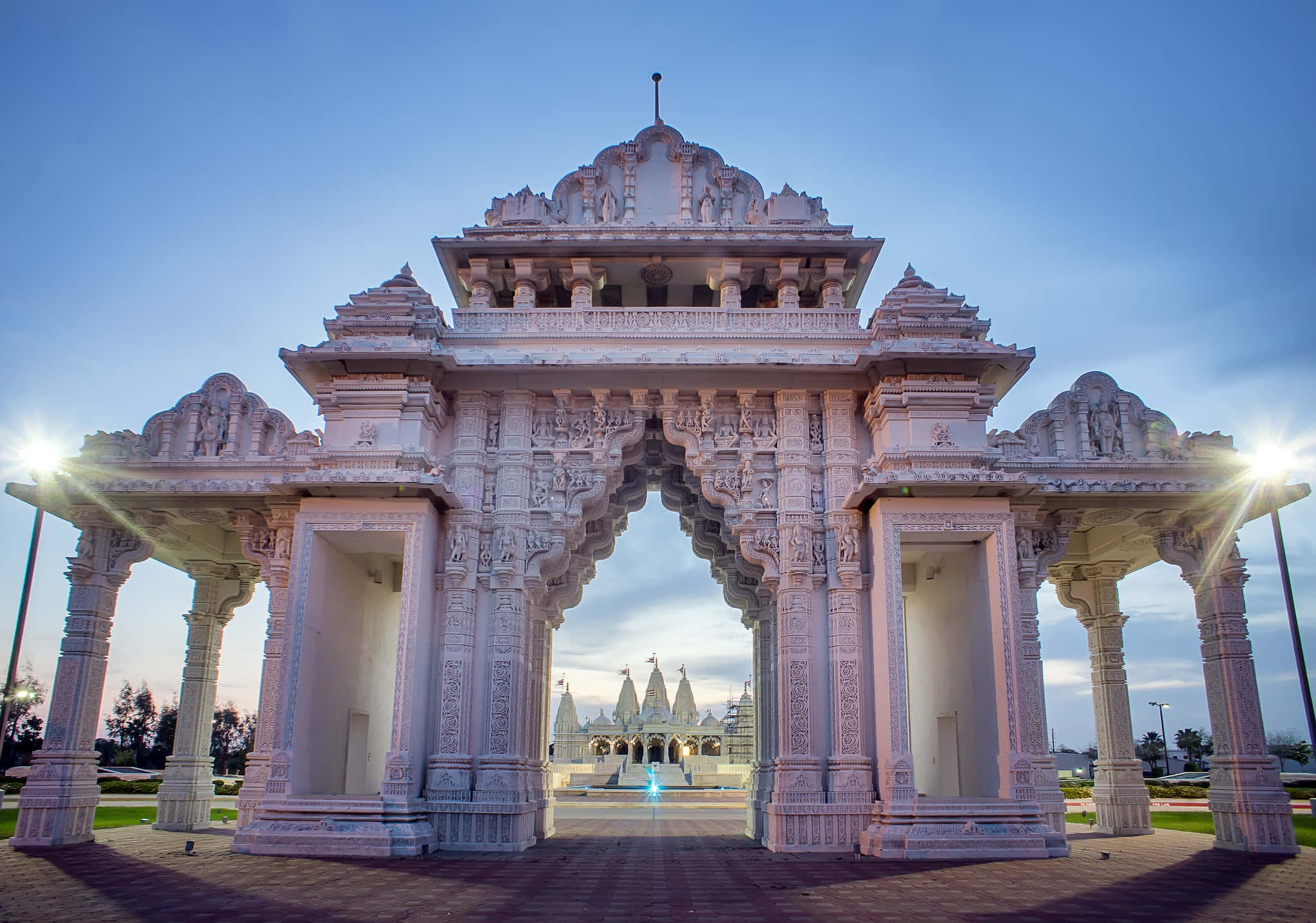 white stone temple gateway, golden sunset light, glowing lamps, Full HD Desktop Wallpaper