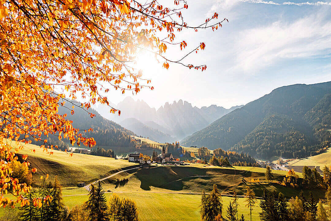 Golden autumn leaves, sunlit valley, quaint village, SD Desktop Wallpaper