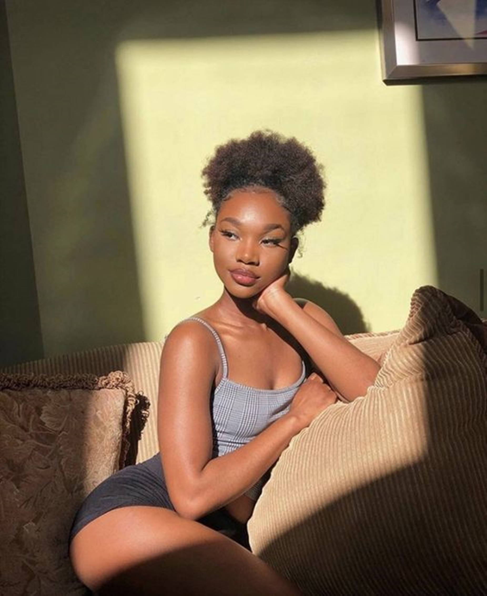 beautiful black woman, curly hair, textured couch, Full HD Phone Wallpaper