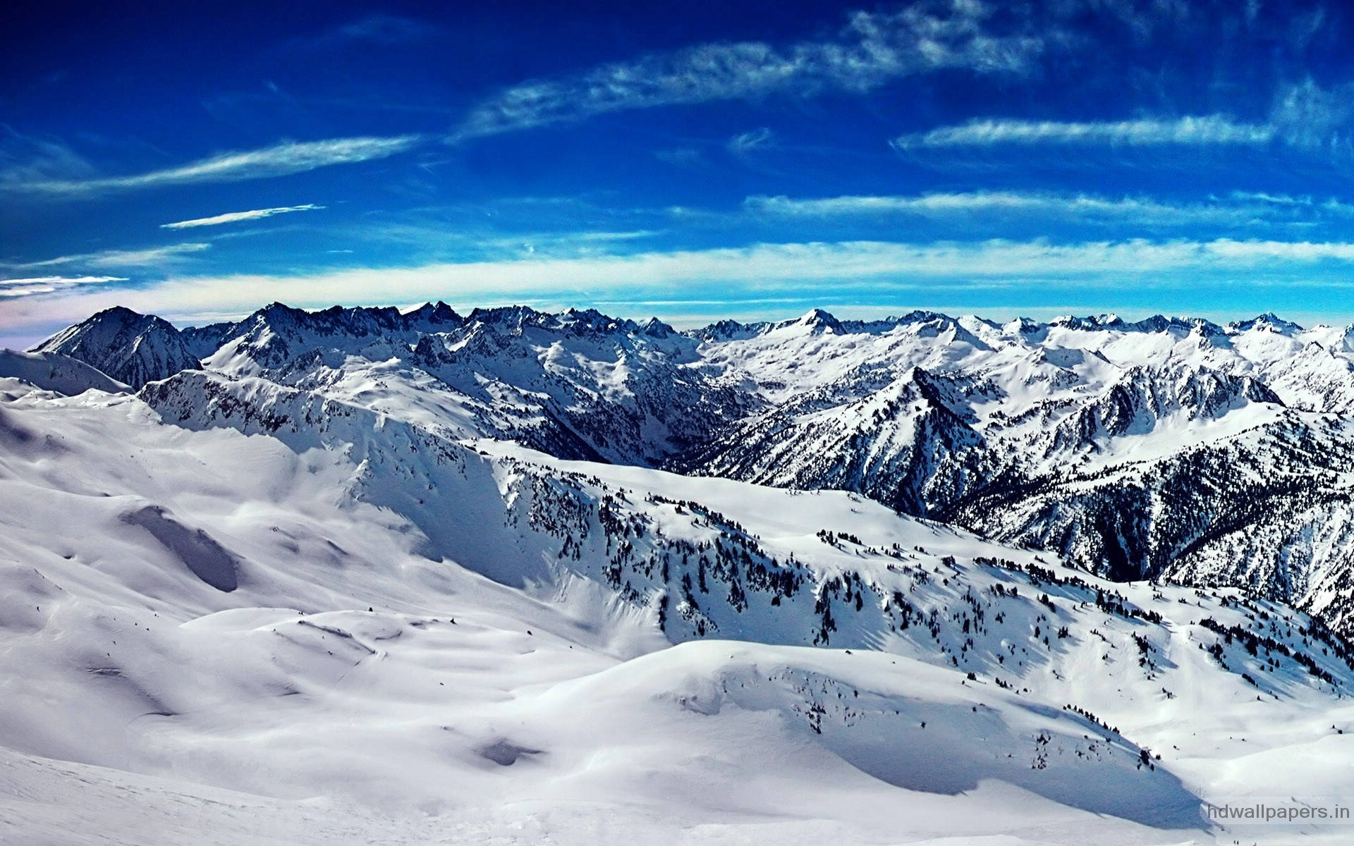snowcapped mountain peaks, vibrant blue sky, wispy clouds, Full HD Desktop Wallpaper