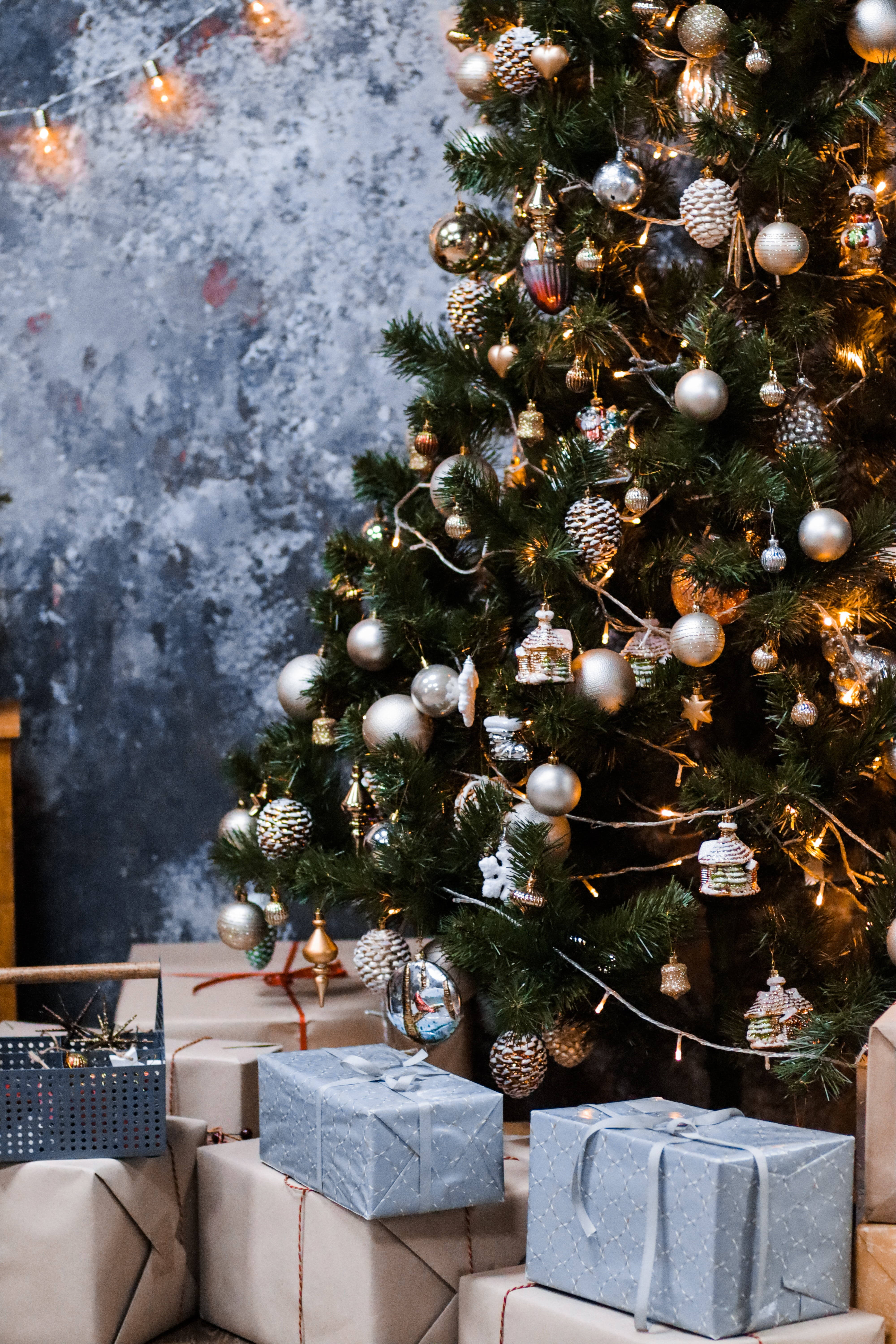Christmas tree, silver and gold ornaments, warm string lights, 5K Phone Wallpaper