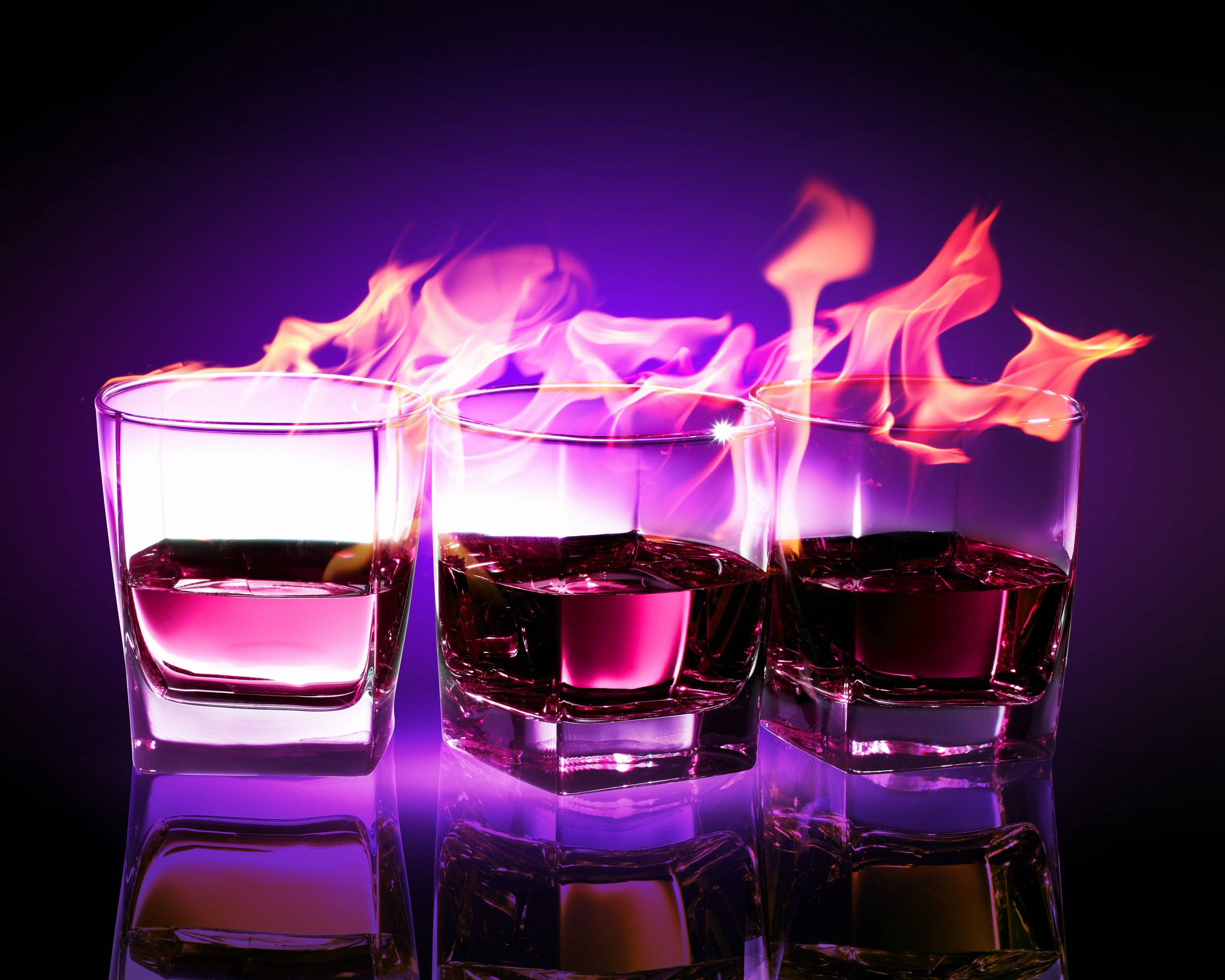 burning rim, flaming whiskey glasses, vibrant purple and orange fire, 2K Desktop Wallpaper