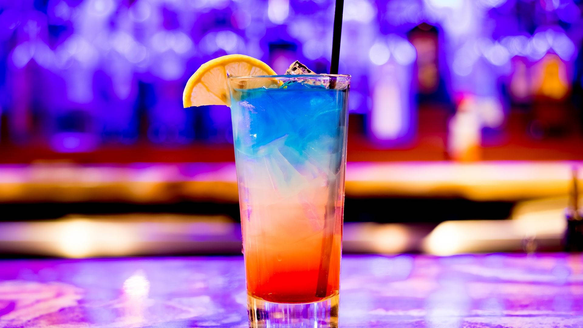 red and blue drink, vibrant gradient cocktail, lemon garnish, Full HD Desktop Wallpaper