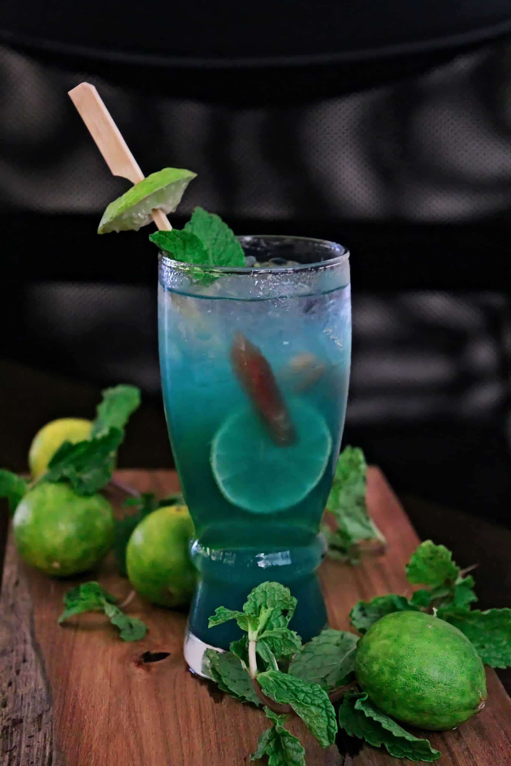 vibrant blue cocktail, lime, mint garnish, 2K Phone Wallpaper