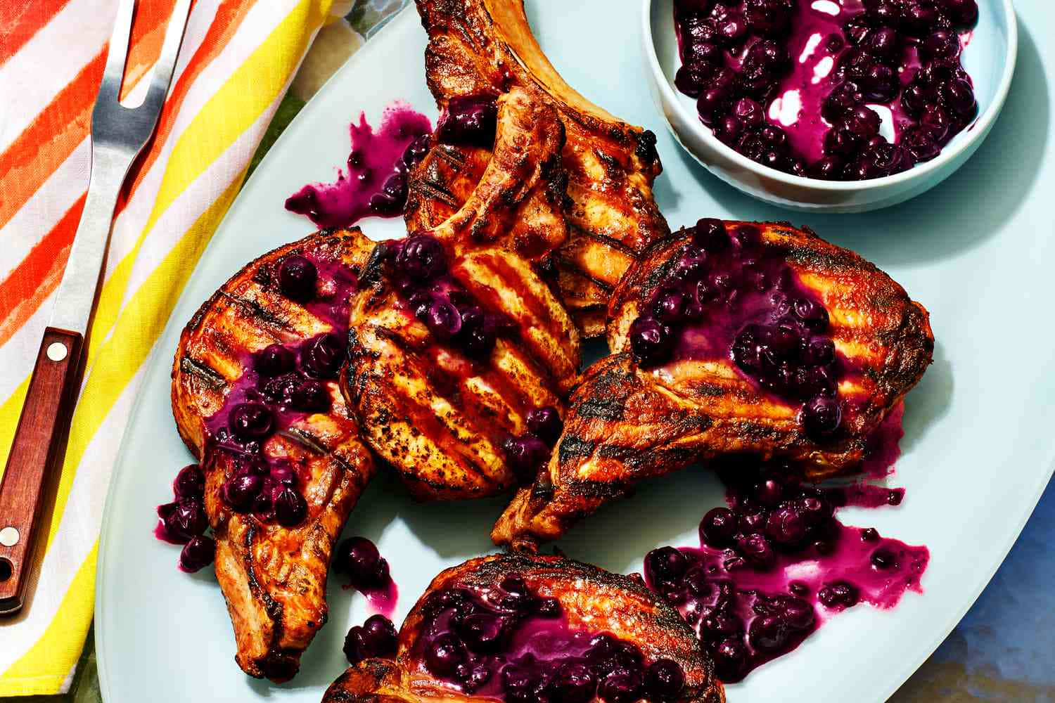 grilled pork chops, vibrant purple blueberry sauce, white plate, HD Desktop Wallpaper