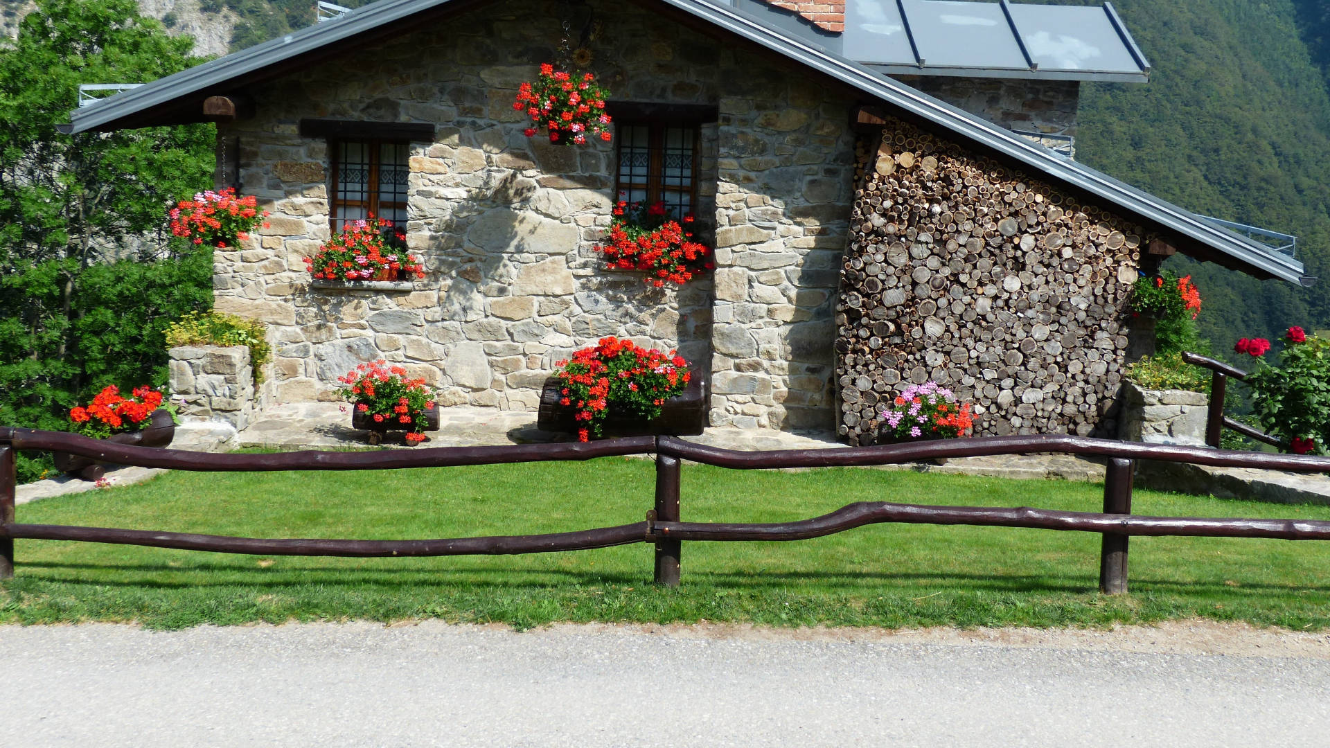 gray stone, rustic stone cabin, vibrant red flowers, Full HD Desktop Wallpaper