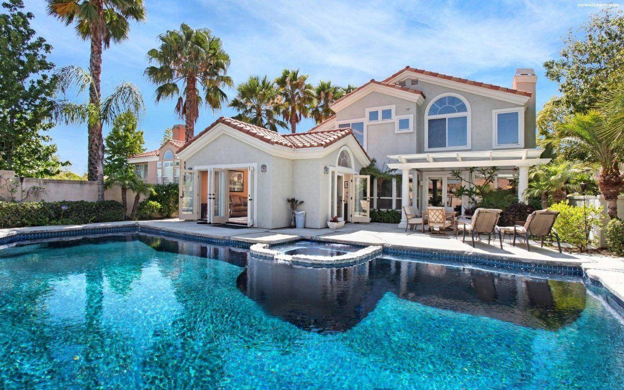 Mediterranean-style villa, sparkling blue pool, palm trees, HD Desktop Wallpaper