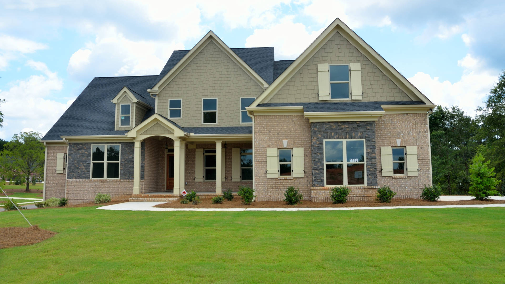 beige siding, brick accents, dark roof, Full HD Desktop Wallpaper