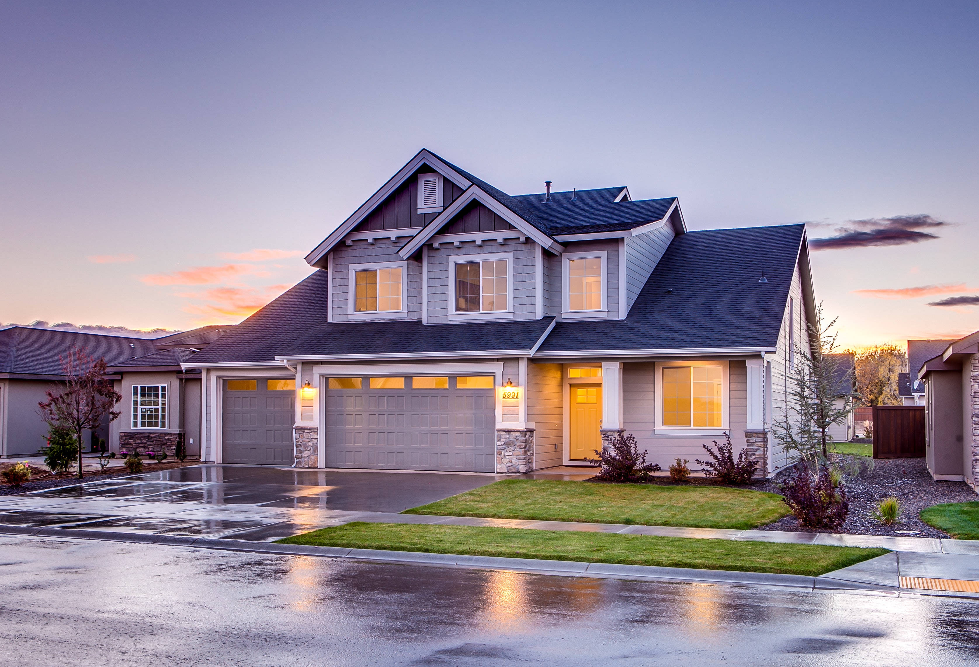 blue roof, modern two-story suburban home, warm interior lights, 2K Desktop Wallpaper