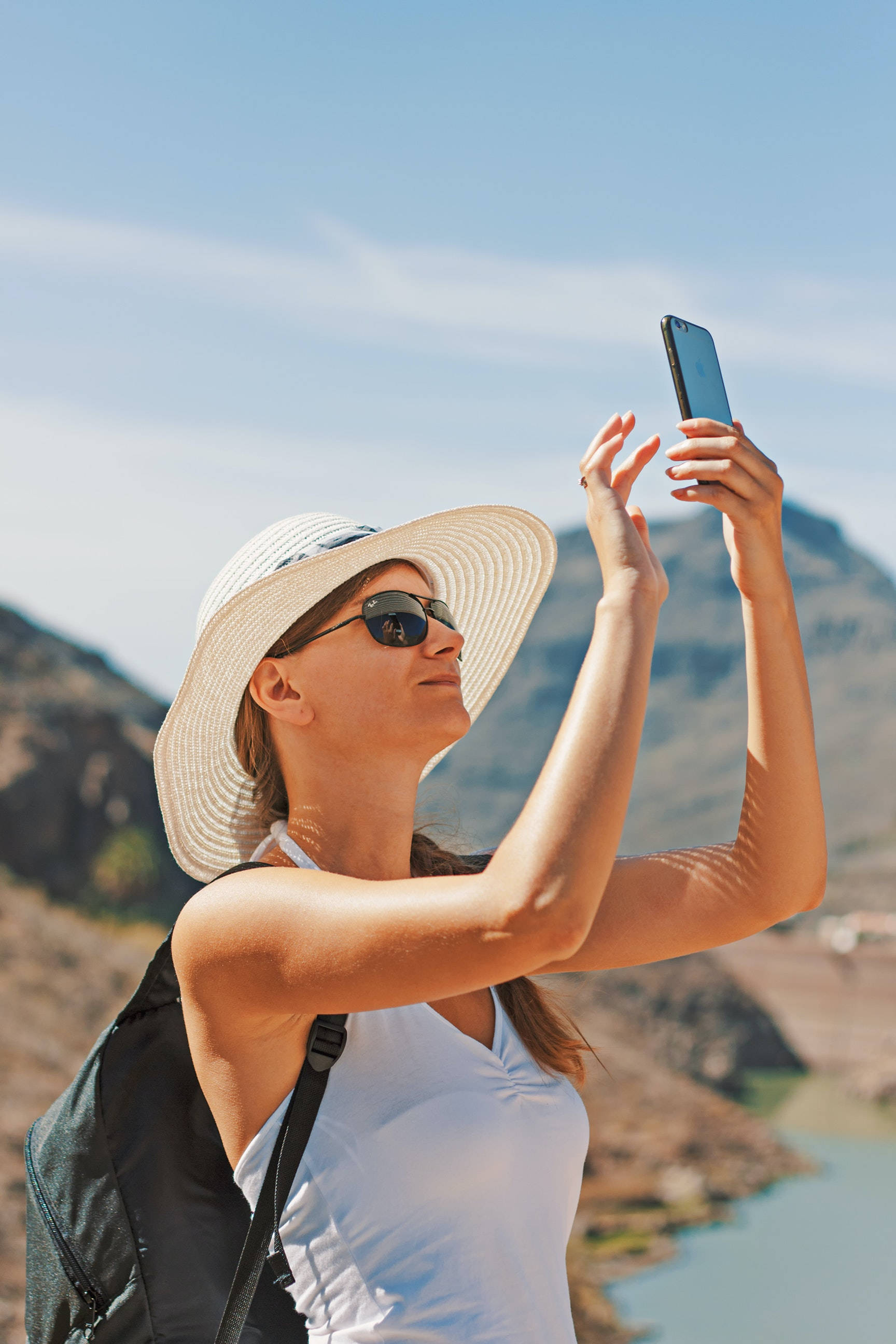 Beautiful iPhone, white hat, sunglasses, 2K Phone Wallpaper