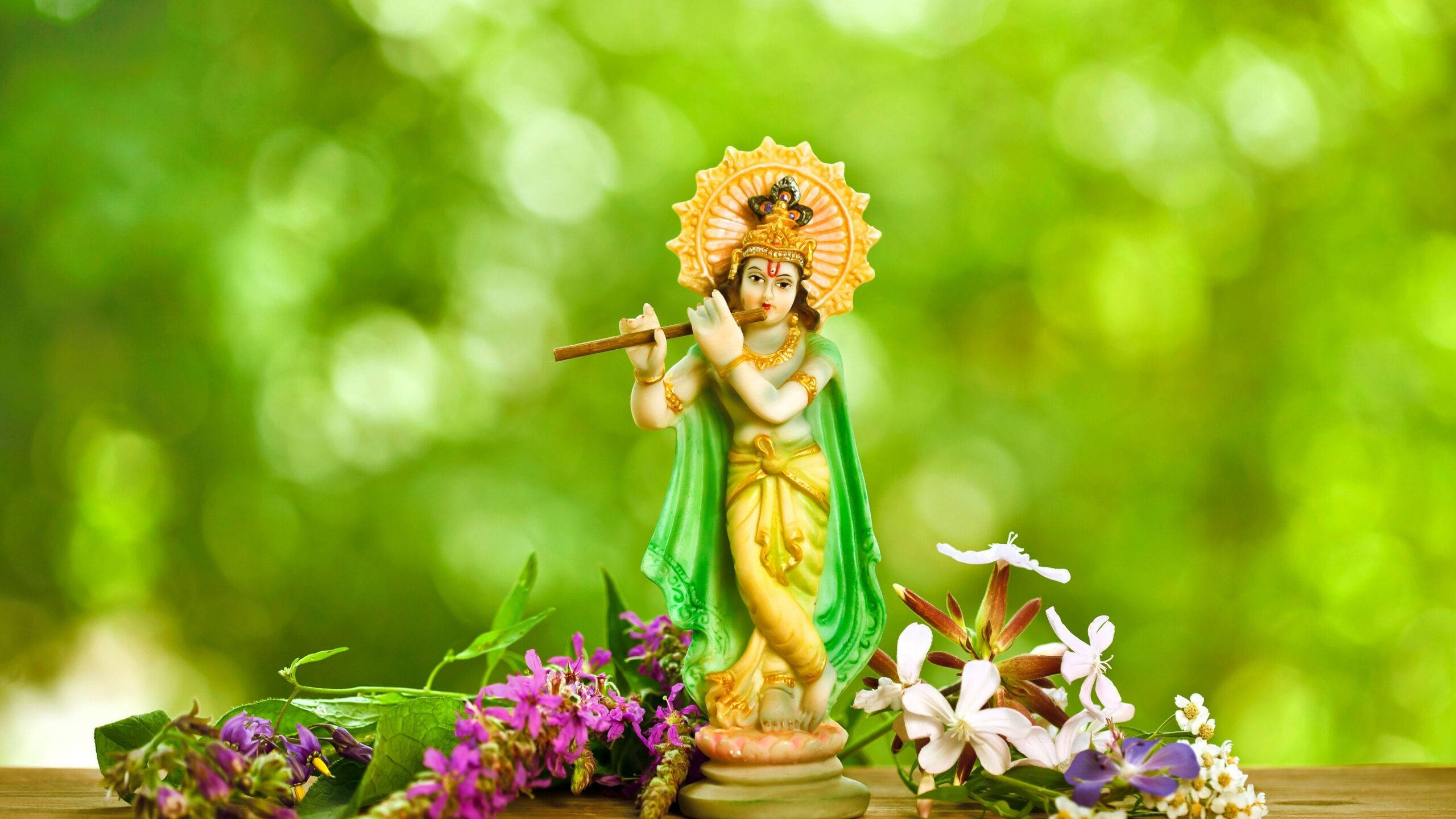 Krishna, golden flute-playing deity, radiant crown, 2K Desktop Wallpaper