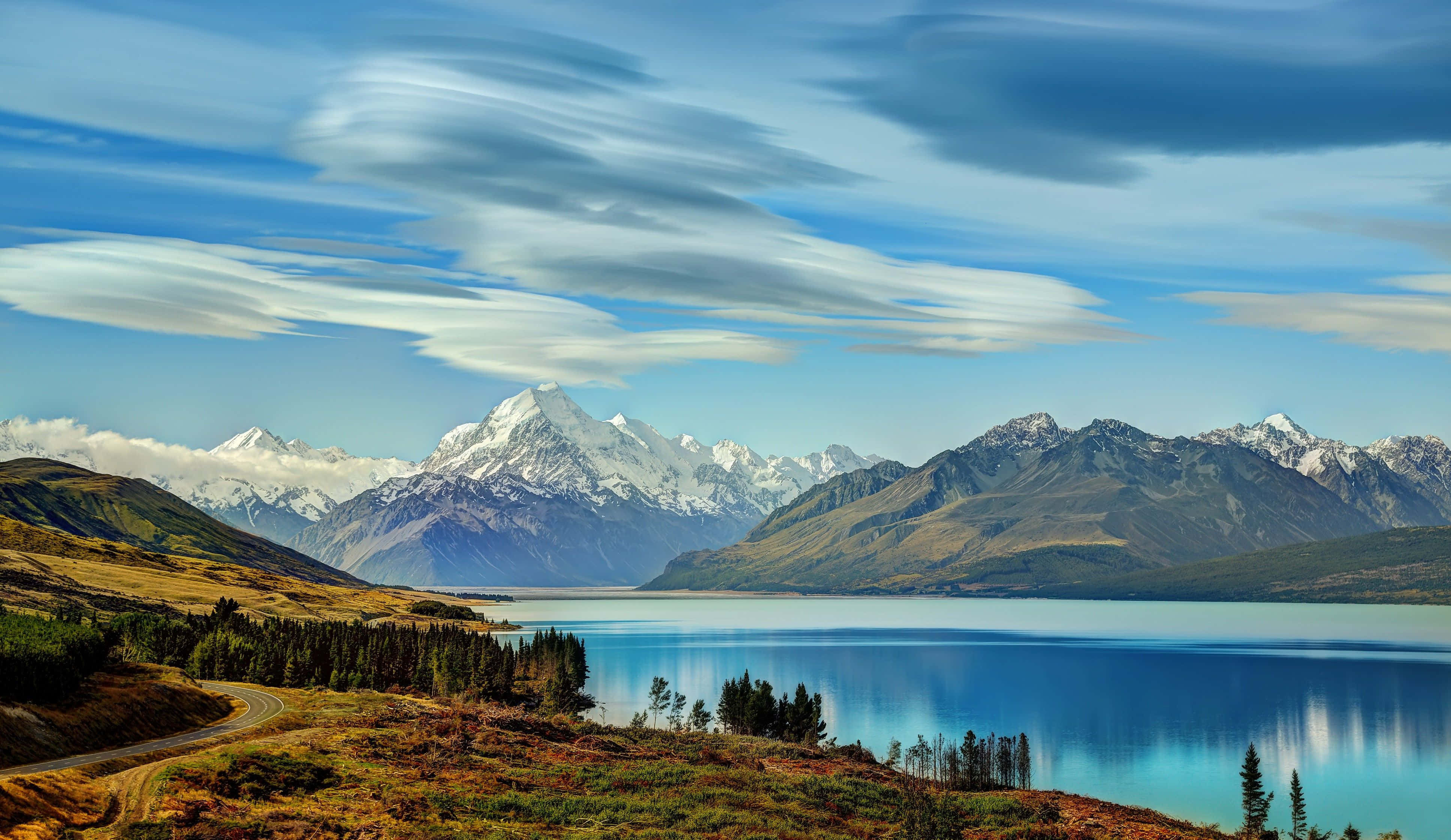 alpine lake, snow-capped mountains, streaked clouds, 4K Desktop Wallpaper