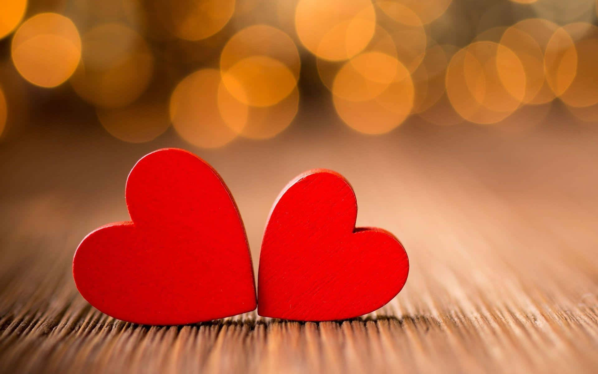 vibrant red wooden hearts, textured wooden surface, warm golden bokeh background, Full HD Desktop Wallpaper