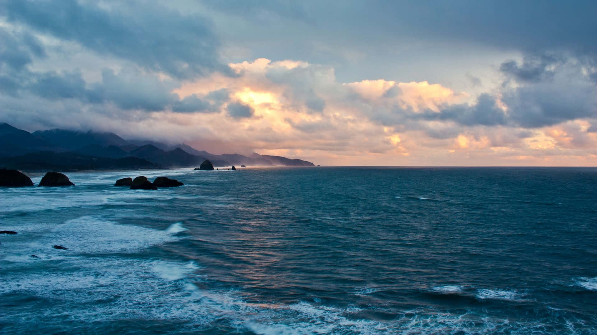 Sunset, turbulent ocean, dark rocks, Full HD Desktop Wallpaper