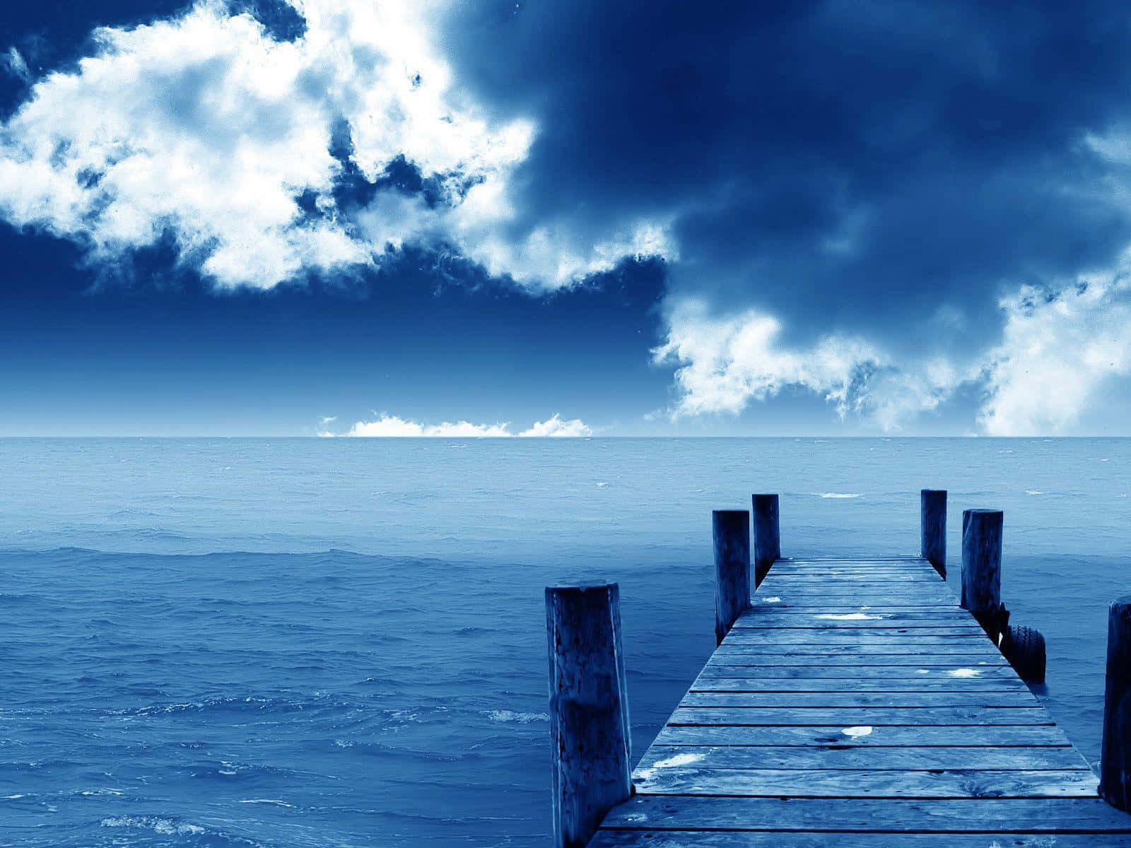 Serene Ocean Waves at Sunset Wallpaper, weathered wooden pier, vast blue ocean, HD Desktop Wallpaper