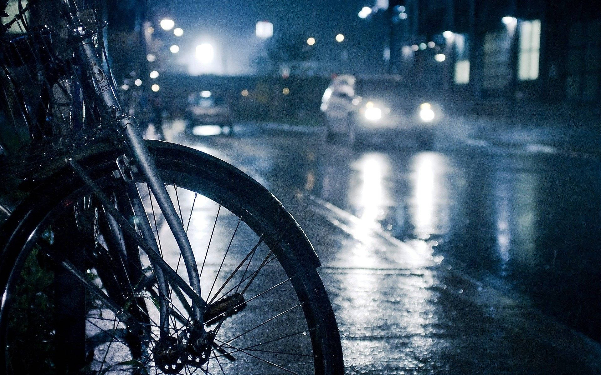 bicycle wheel, rain-slicked street, car headlights, Full HD Desktop Wallpaper