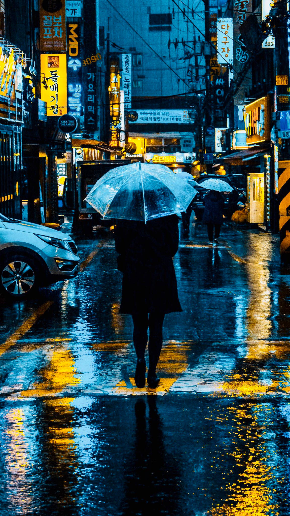 neon-lit Korean street, rain-slicked, vibrant yellow lights, Full HD Phone Wallpaper