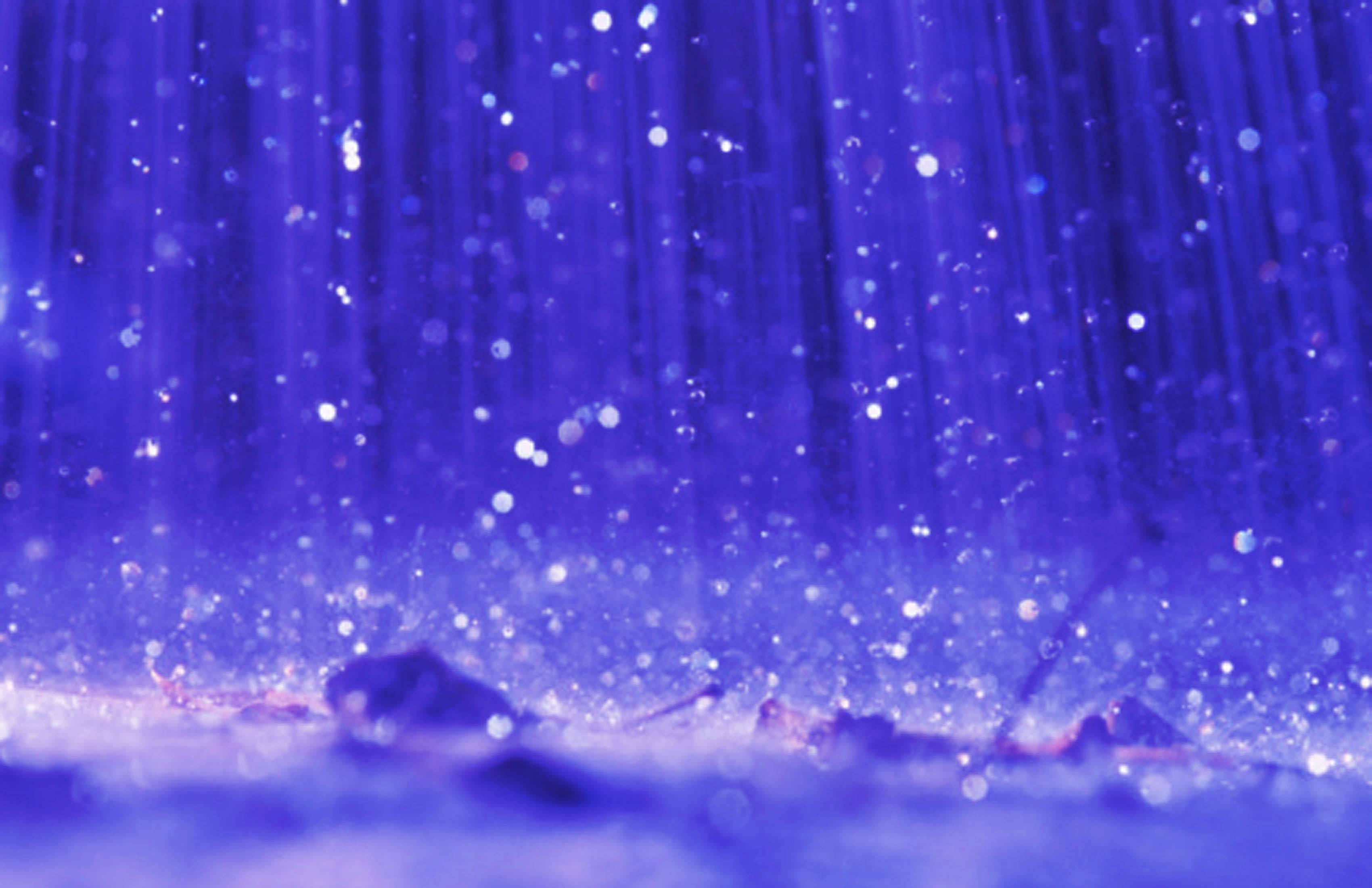 purple rain, vivid purple light beams, floating glitter particles, 2K Desktop Wallpaper