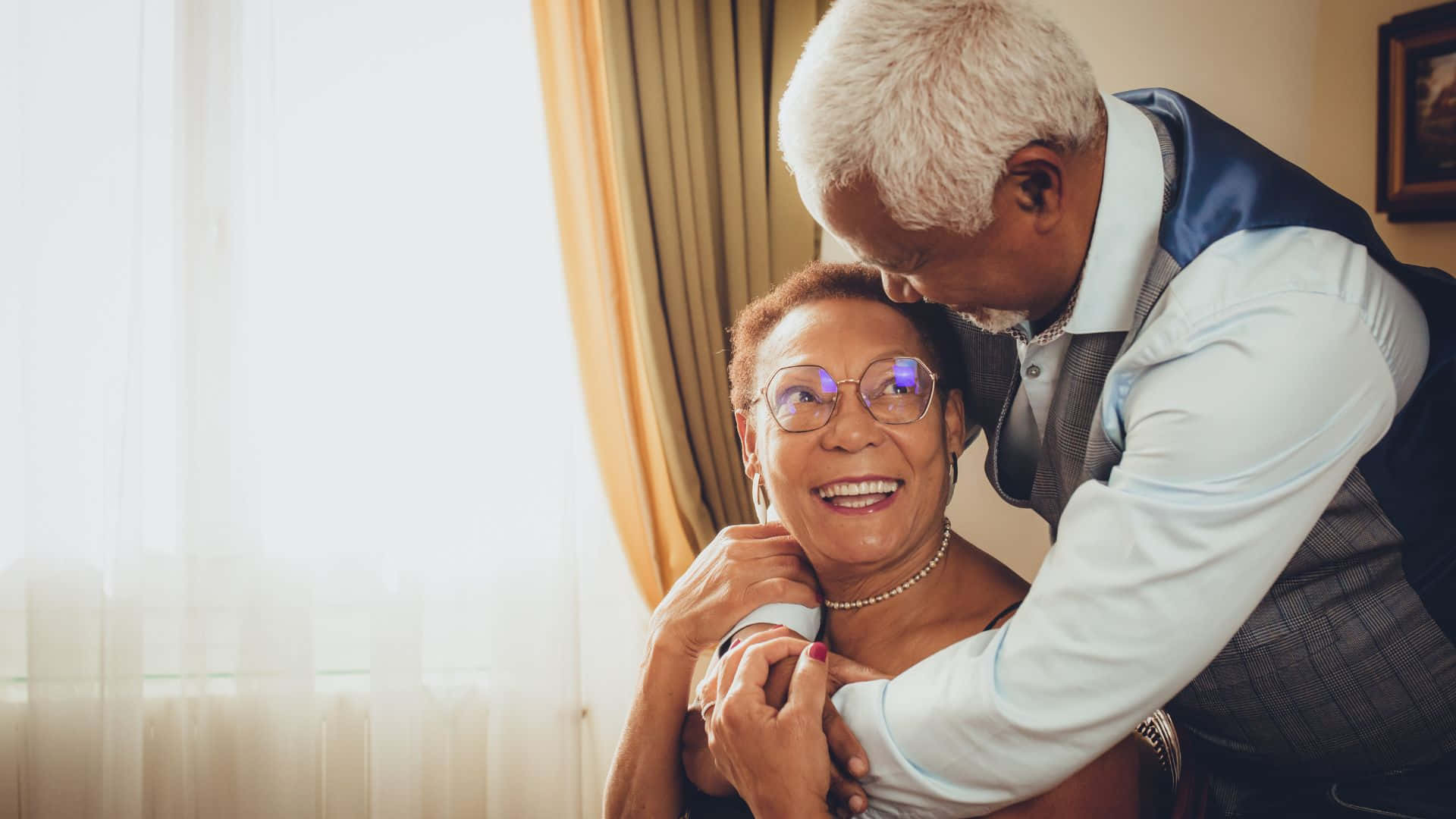 elderly couple, tender embrace, warmly lit room, Full HD Desktop Wallpaper