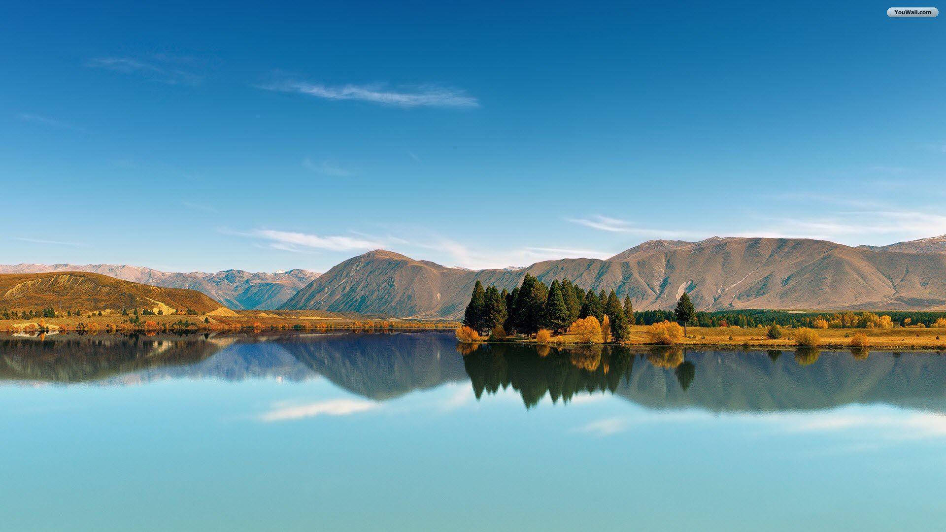 a quiet lake in new zealand, autumn trees, distant mountains, Full HD Desktop Wallpaper