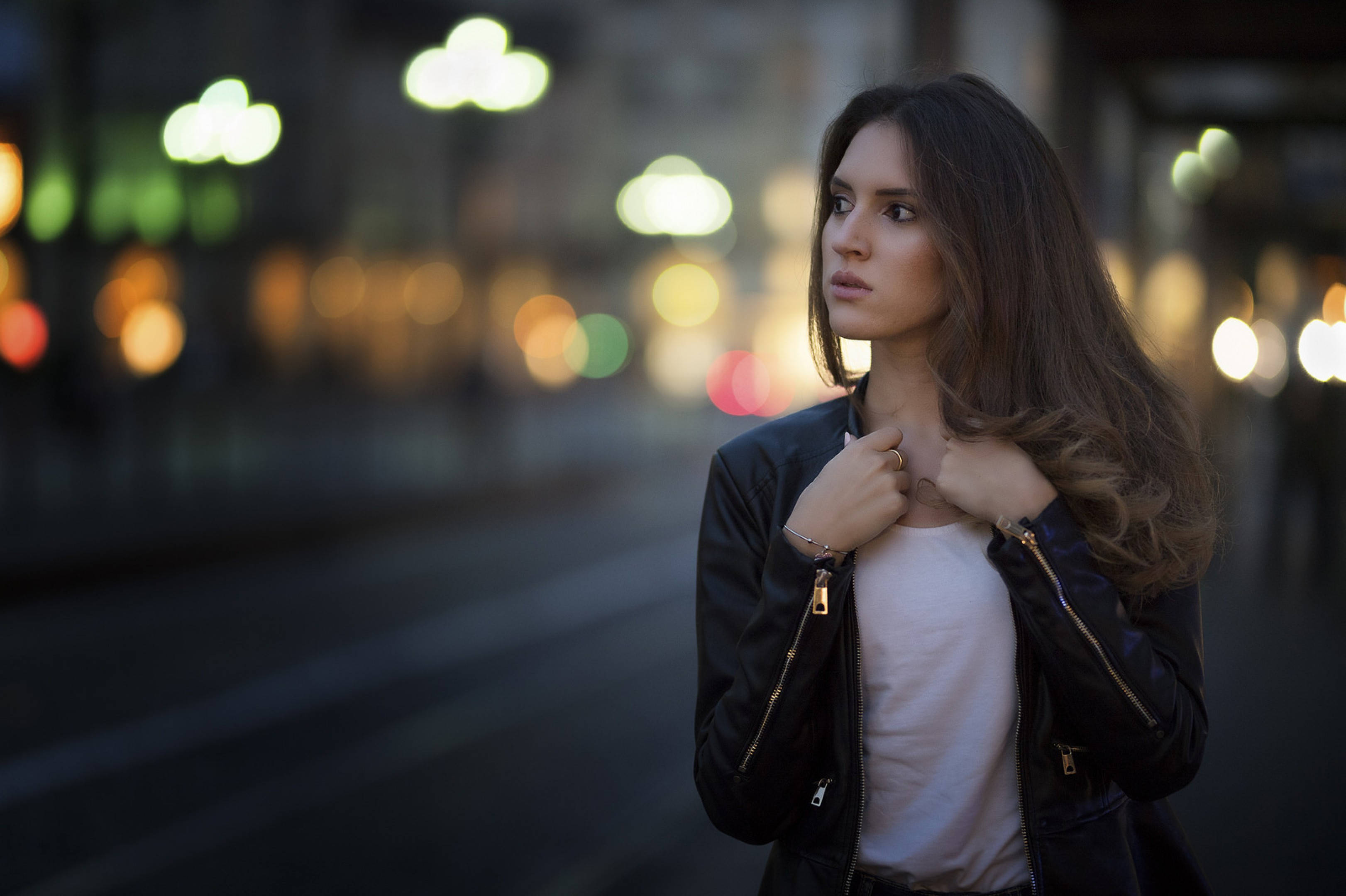 beautiful teenage girl, black leather jacket, city street, 2K Desktop Wallpaper