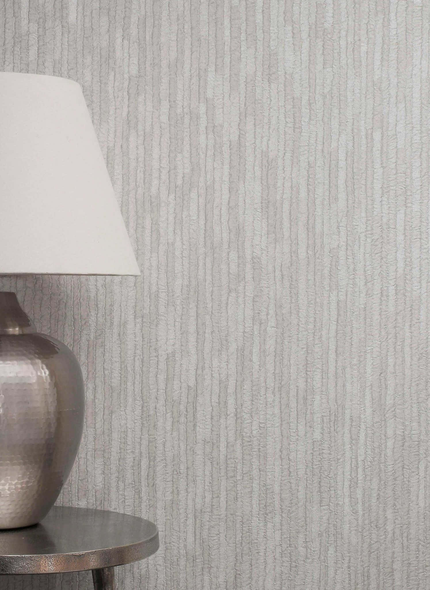 metallic lamp, round side table, textured gray vertical-striped wallpaper, Full HD Phone Wallpaper